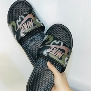 nike slides with smiley face