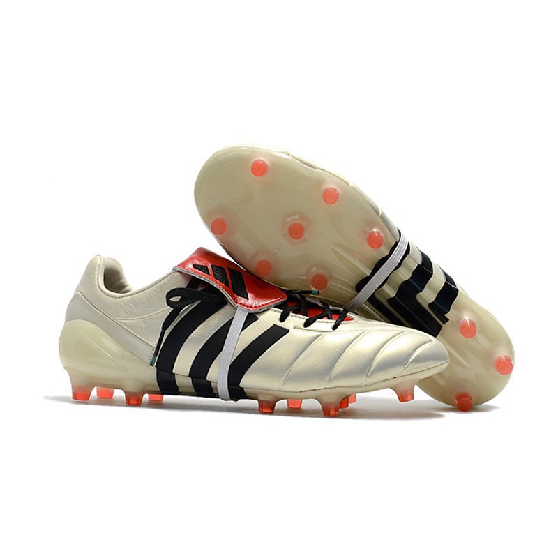 gold predator boots