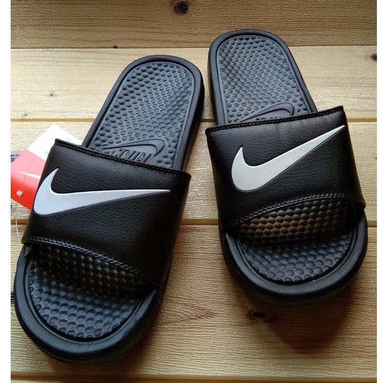 nike swoosh slides