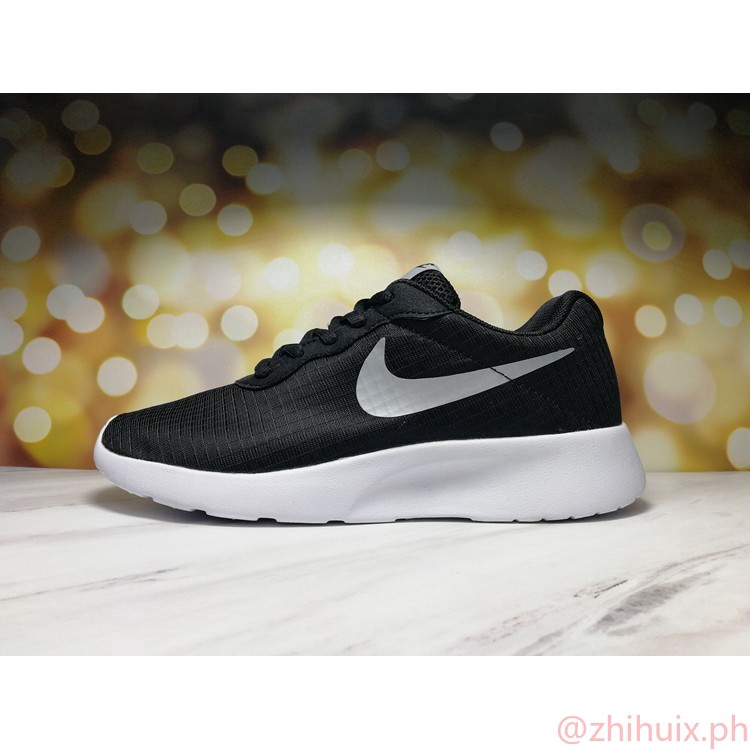 nike roshe run tanjun