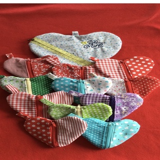 Heart-shaped Pouch in patchwork cotton fabric with nylon zipper.