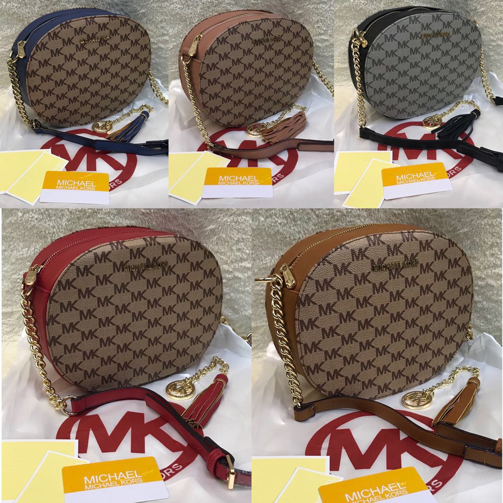 authentic mk sling bag