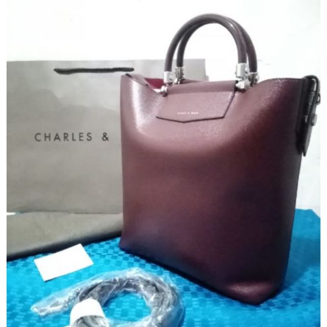 Original Charles  and Keith  maroon handbag with detachable 