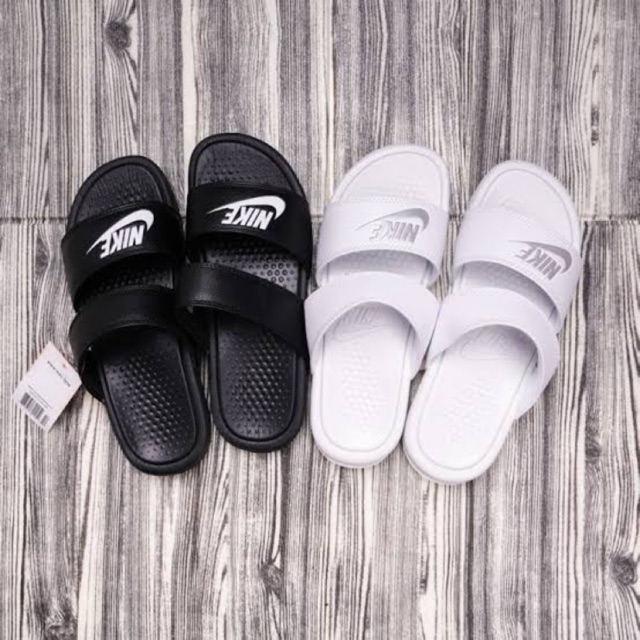 white nike two strap slides