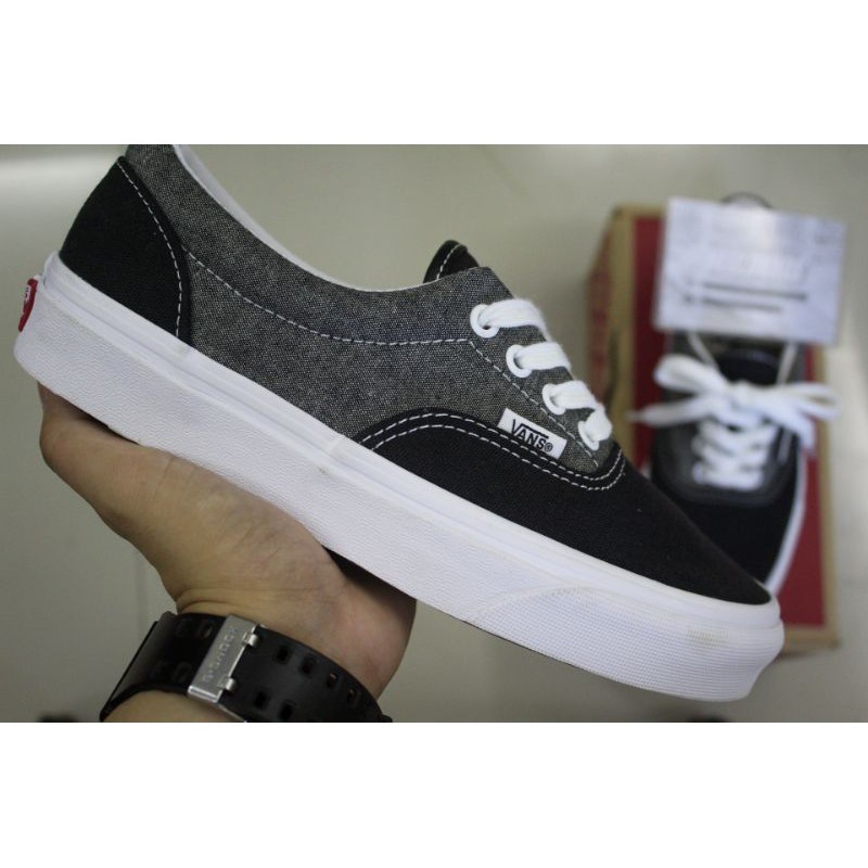 black and grey vans era
