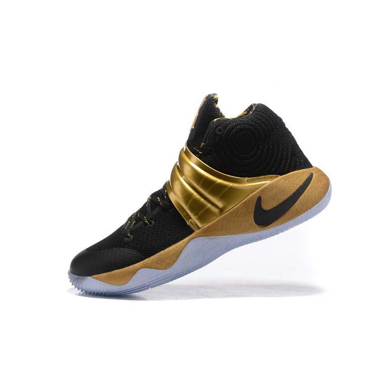 kyrie shoes black and gold