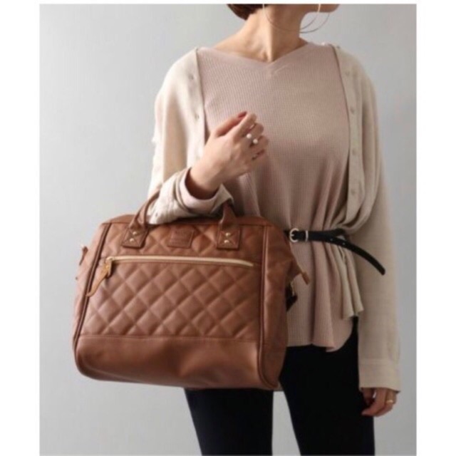 anello quilted sling bag
