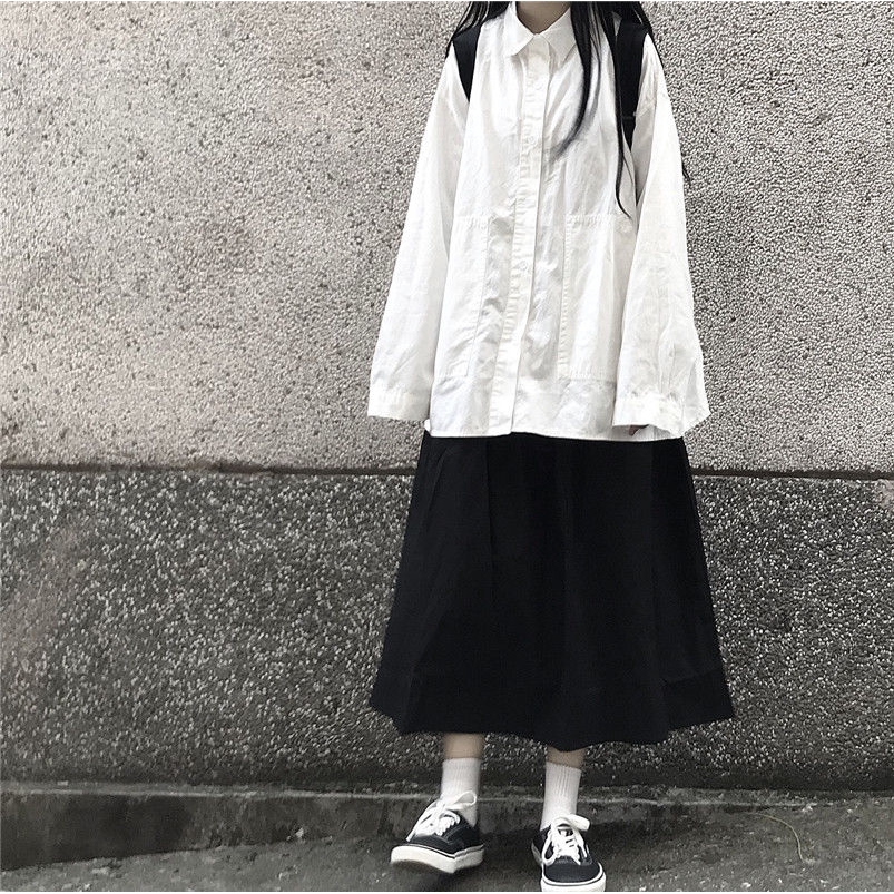 long black skirt with white shirt