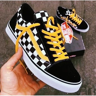 yellow black and white vans