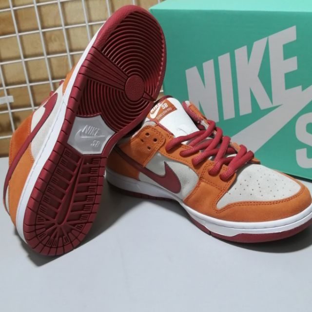 grey and red nike sb