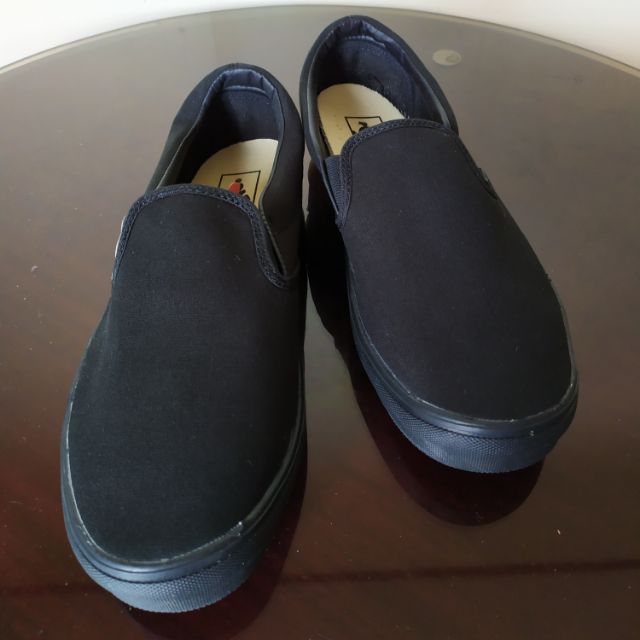 plain black slip on vans