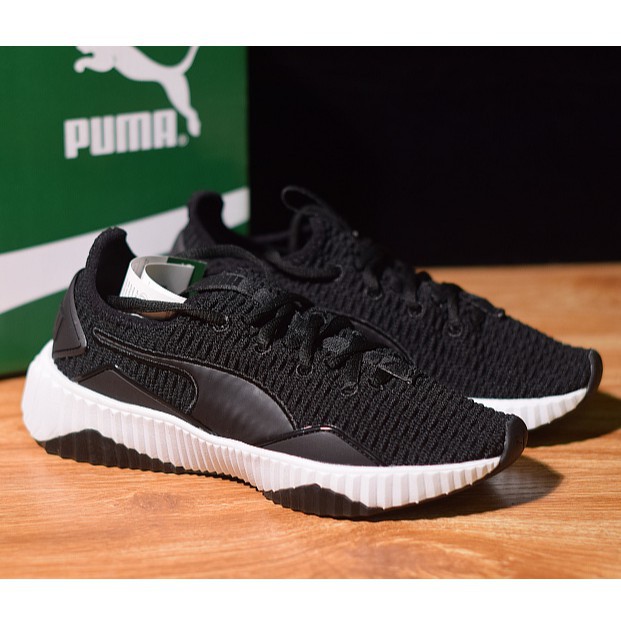 ladies black sports shoes