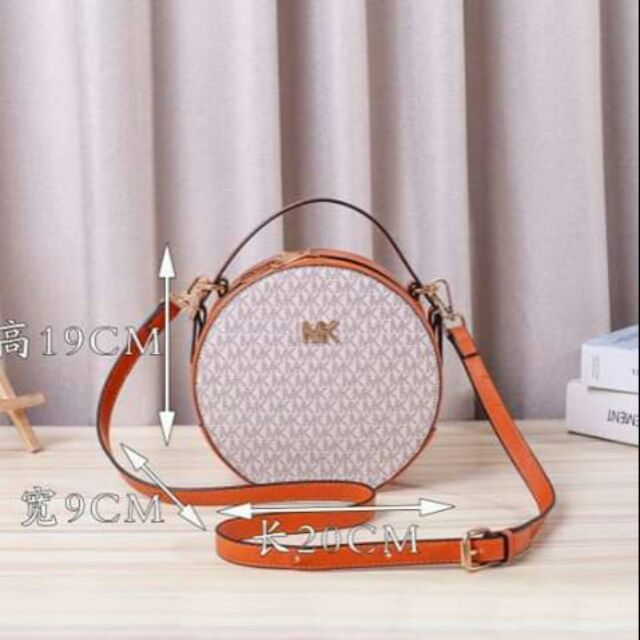 mk round sling bag