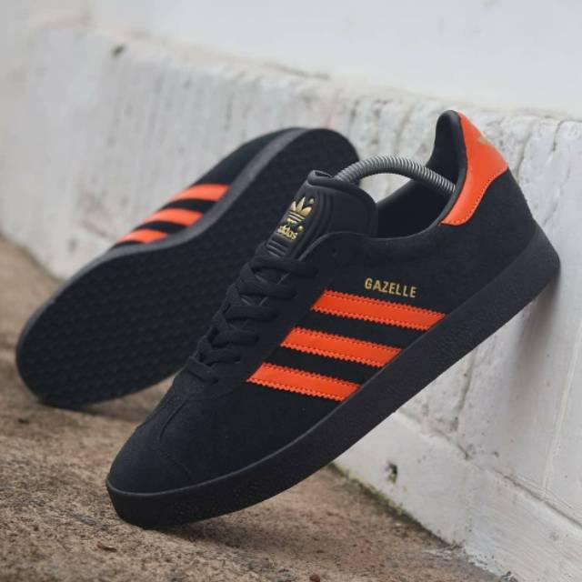 black and orange adidas gazelle