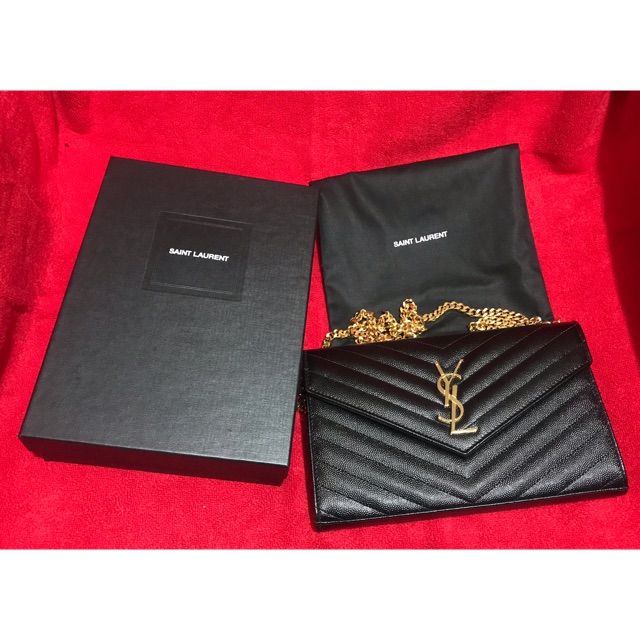 red ysl wallet on chain