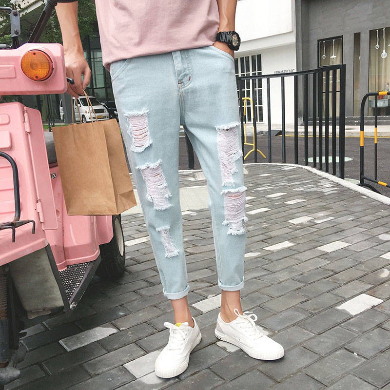 jeans with a lot of holes