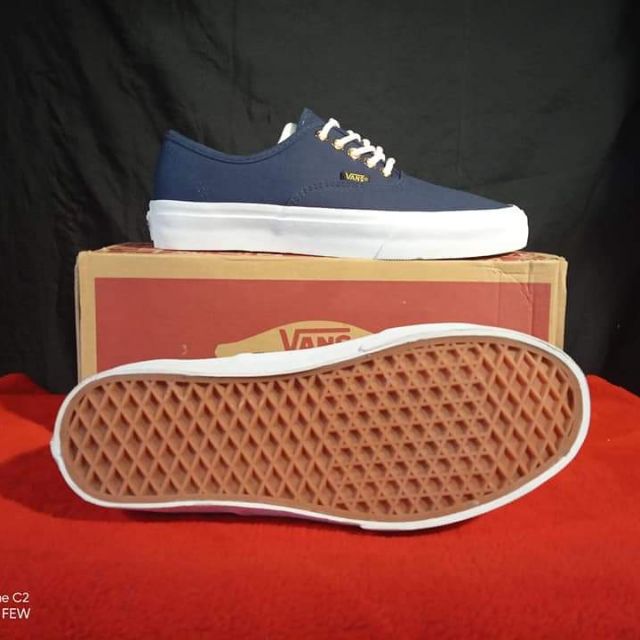 red and white vans off the wall shoes