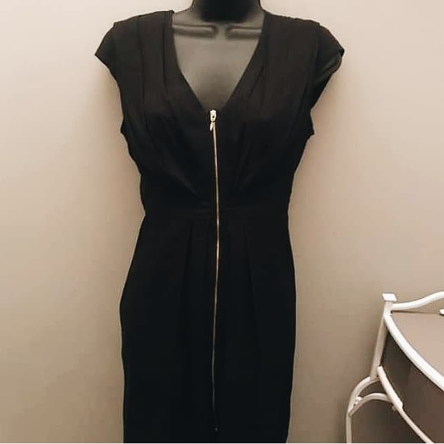 black dress with gold zipper