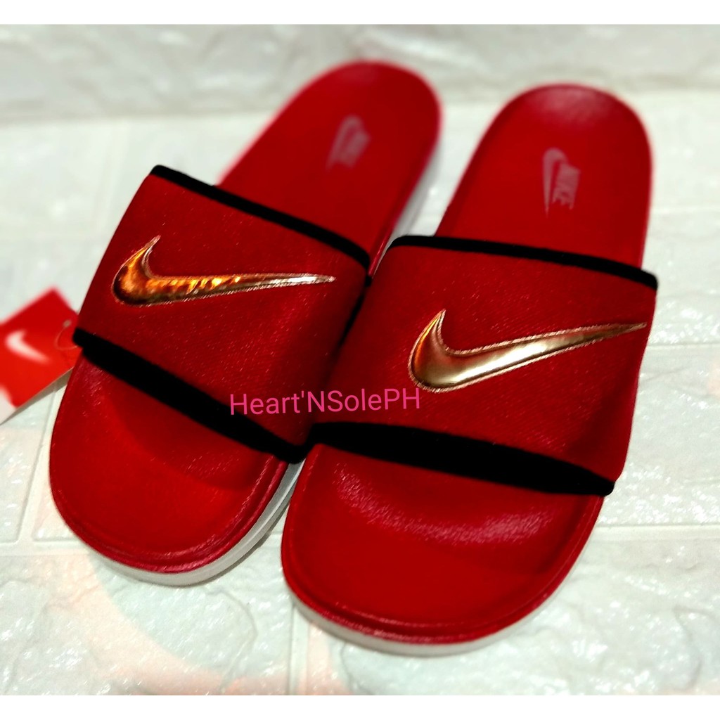 red gold nike slides