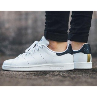 white and navy stan smith