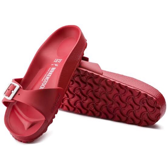 red plastic birkenstocks