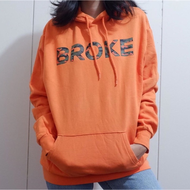 broke orange hoodie