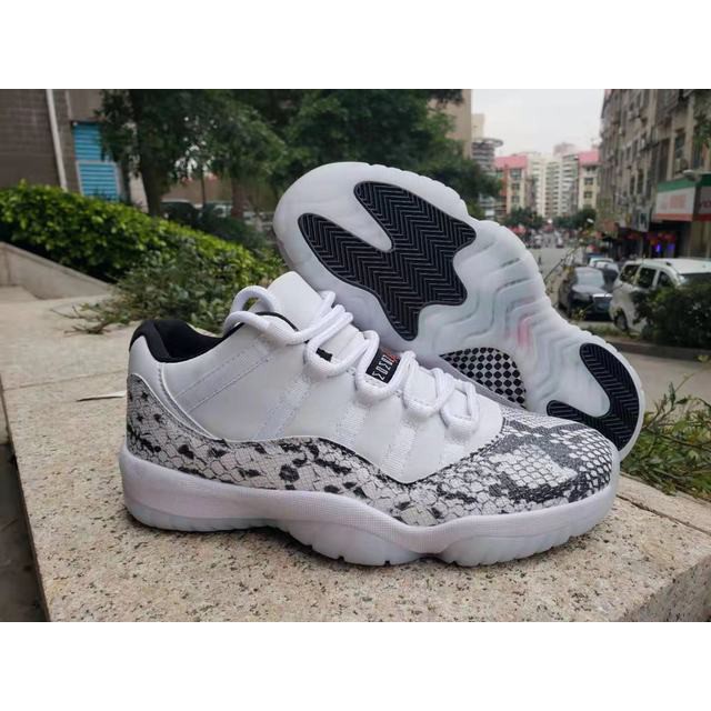 grey and white snakeskin 11s