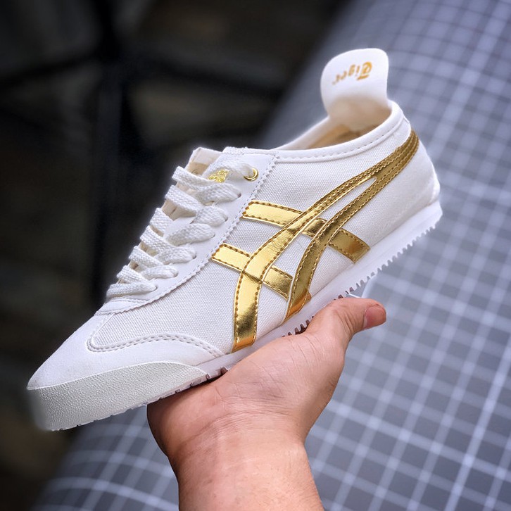 asics white and gold