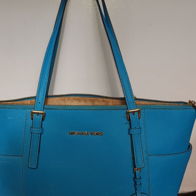 mk blue handbag