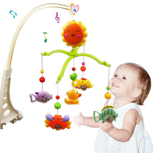 baby bed with hanging toys