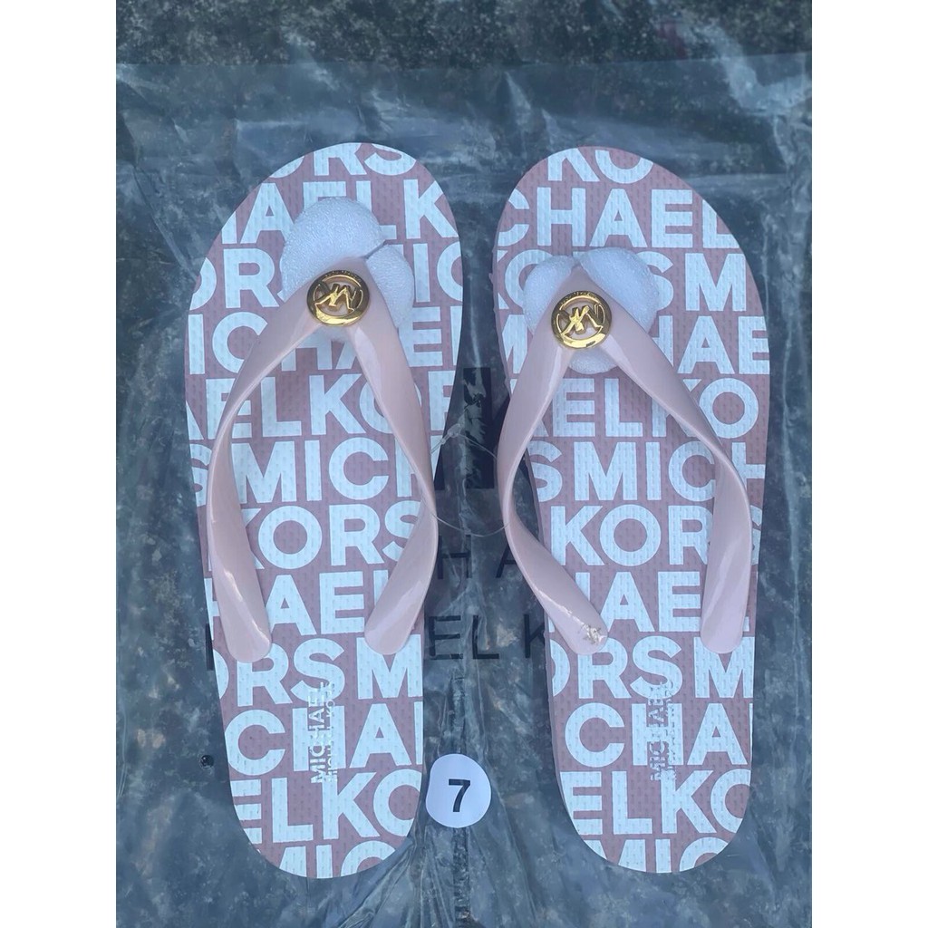 mk flip flops pink