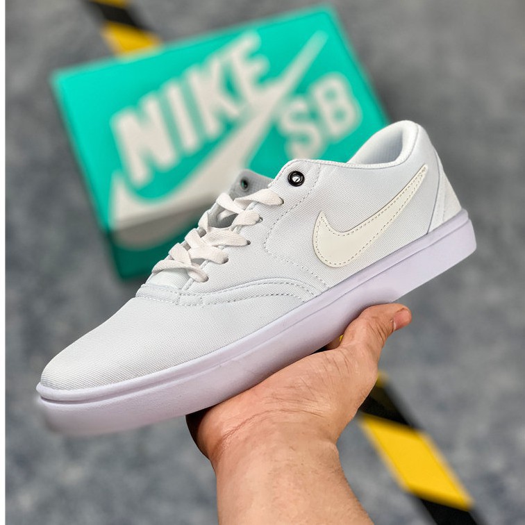 nike sb check solar canvas white