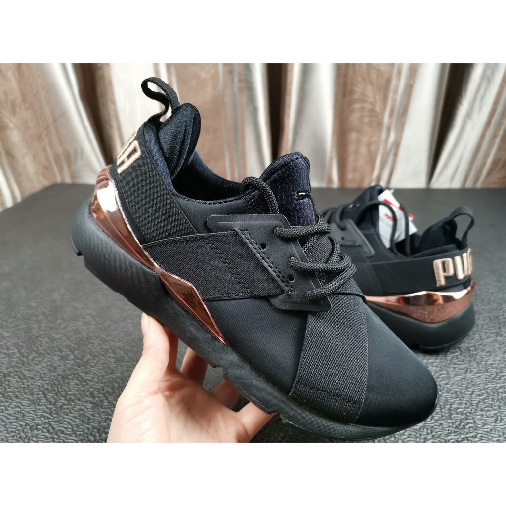 black and rose gold puma muse