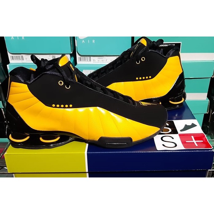 nike shox bb4 black and yellow