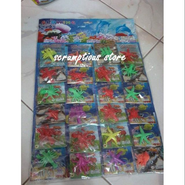 Kisses toys animals grows in water 