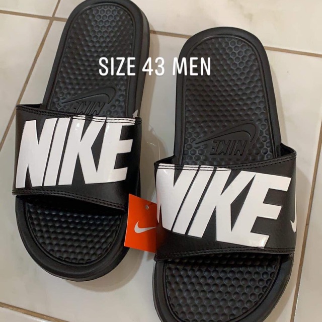 orange and black nike slides