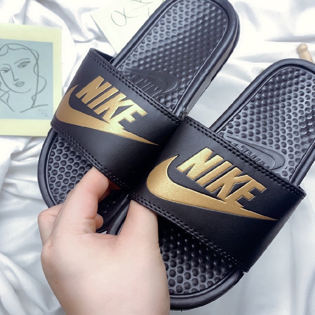 nike black daily slippers