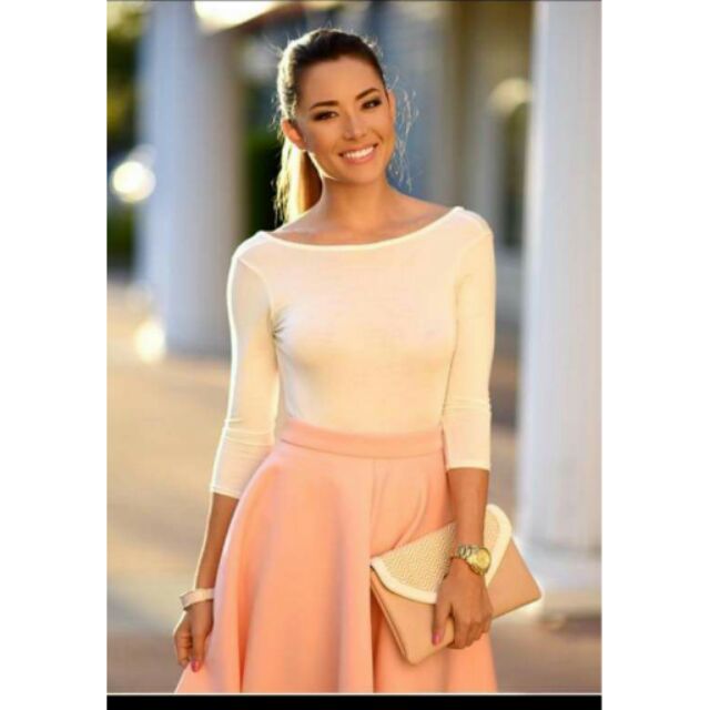 pink top and white skirt