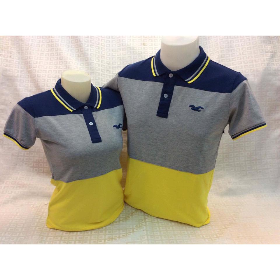 grey and yellow polo shirt