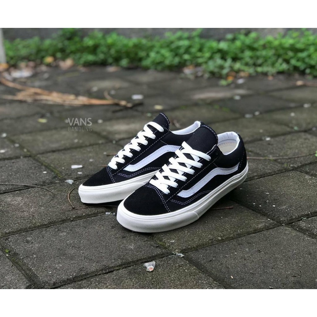 black vans with black laces