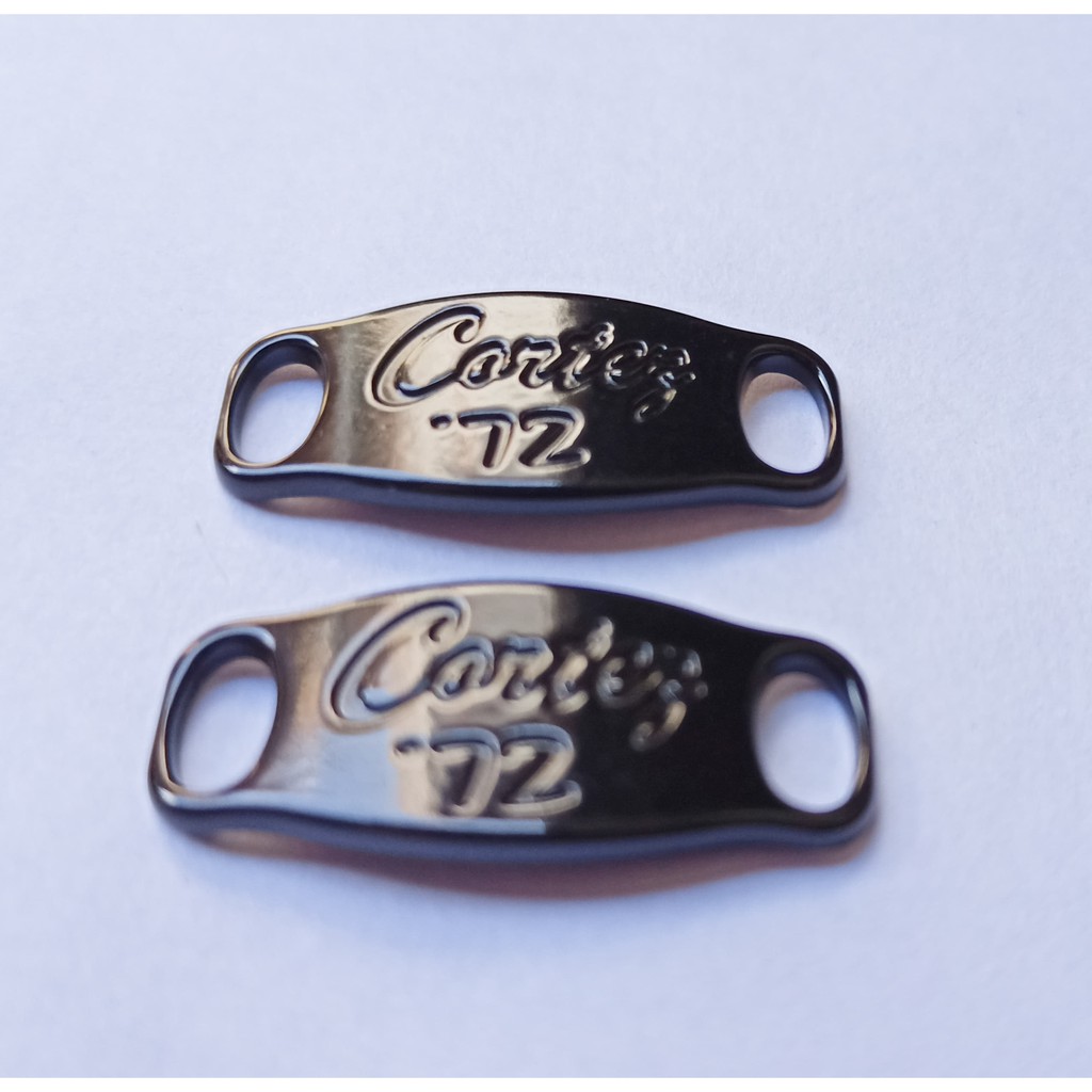 nike cortez metal piece
