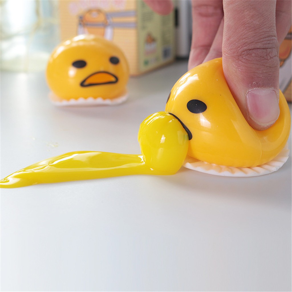 squishy puking egg yolk stress ball