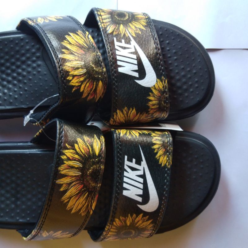 white nike sunflower slides