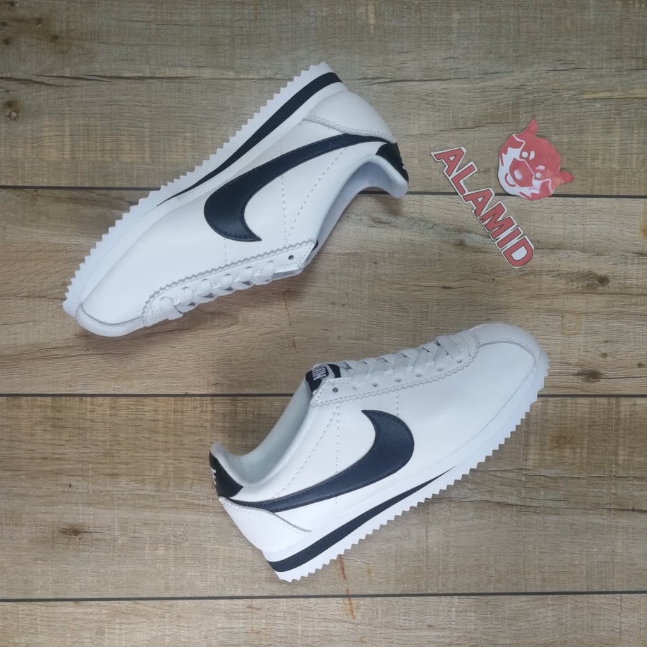 white and black cortez mens