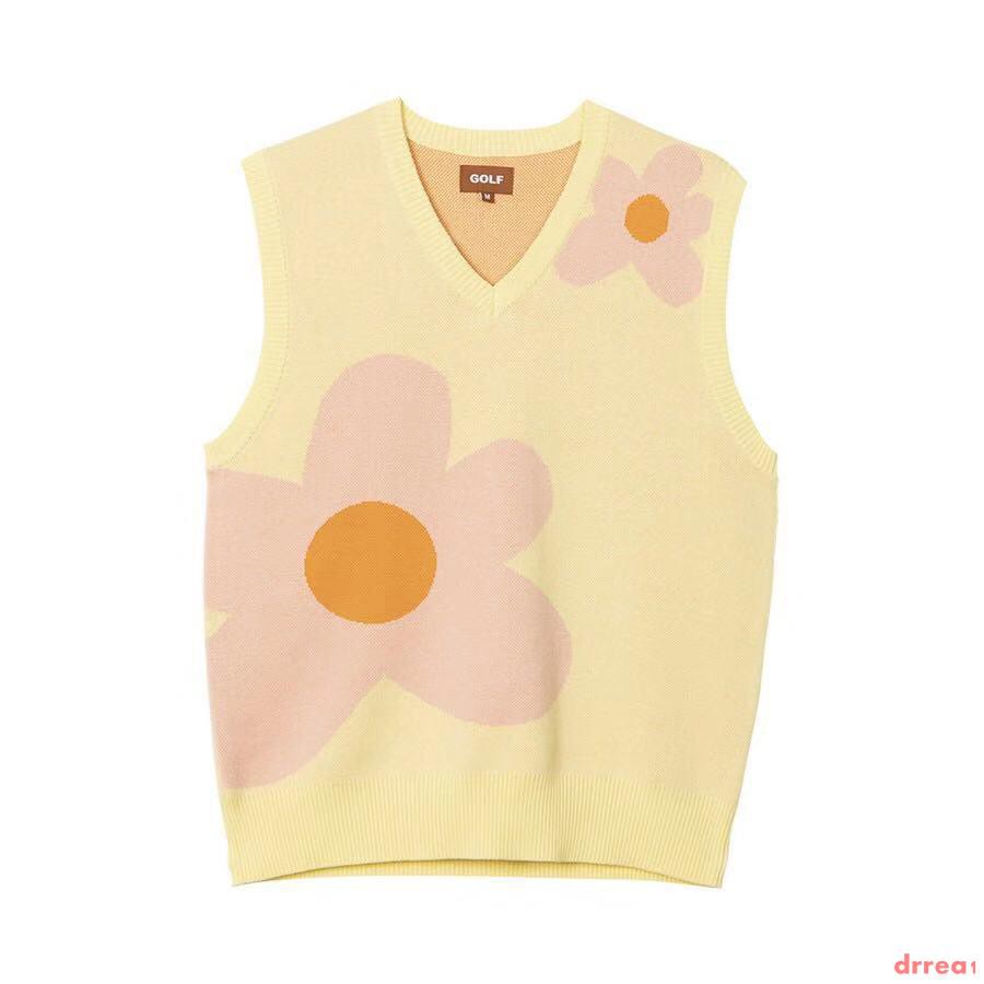 yellow sweater vest