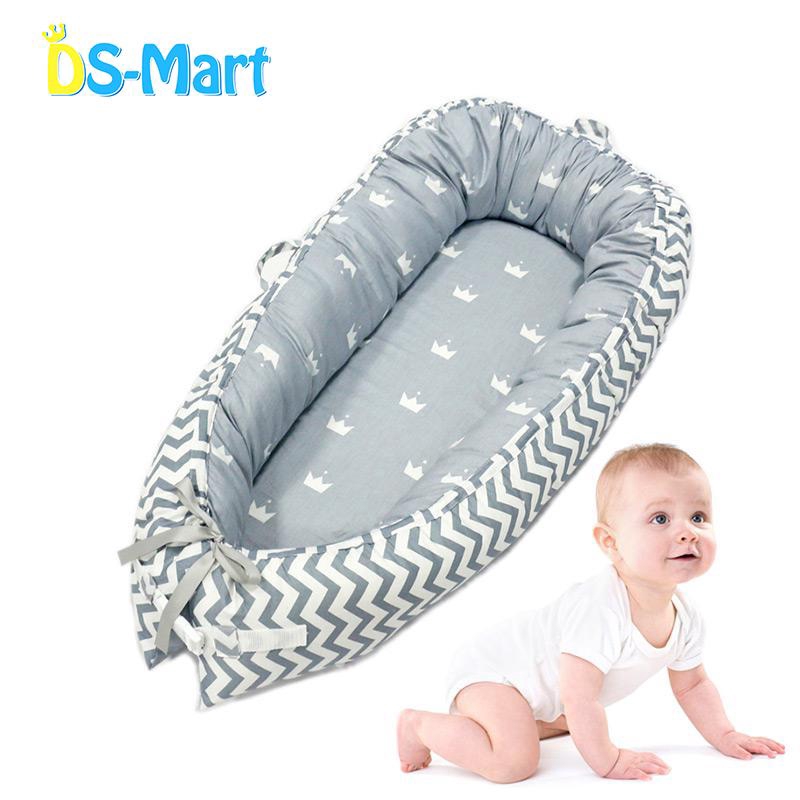 snuggle nest baby lounger