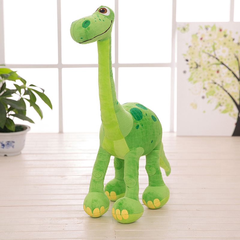 green stuffed dinosaur