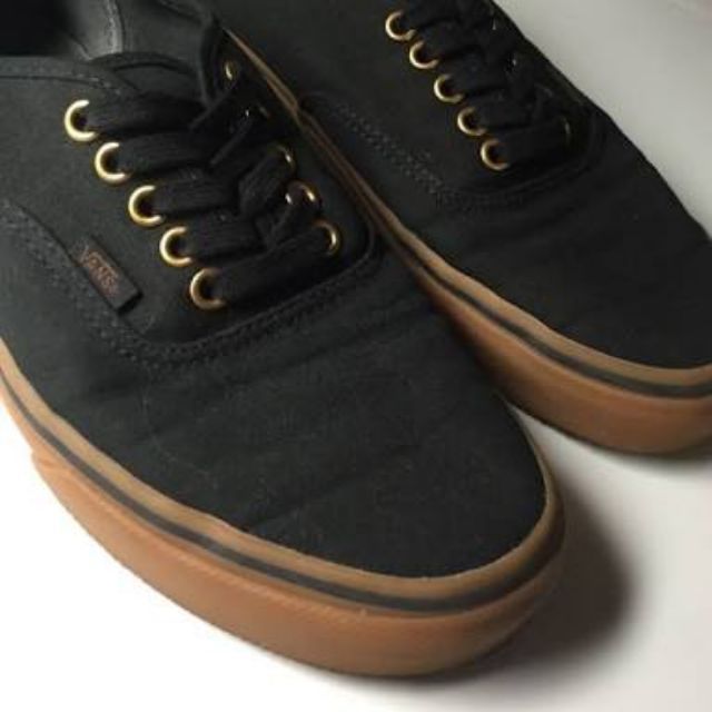 black vans with gold eyelets