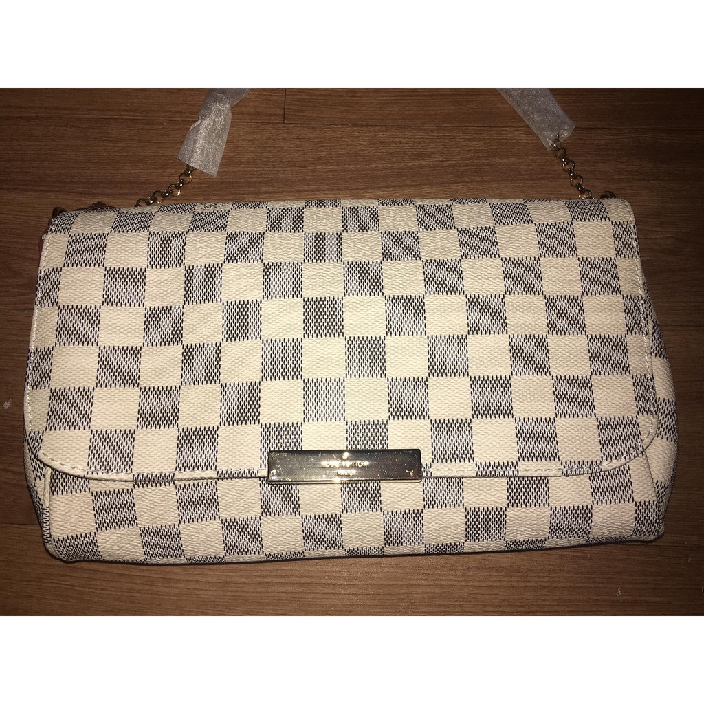 white lv sling bag