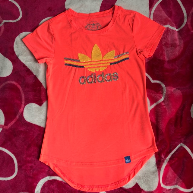 neon orange adidas shirt